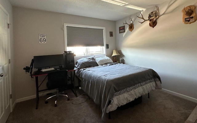 bedroom with carpet floors and baseboards