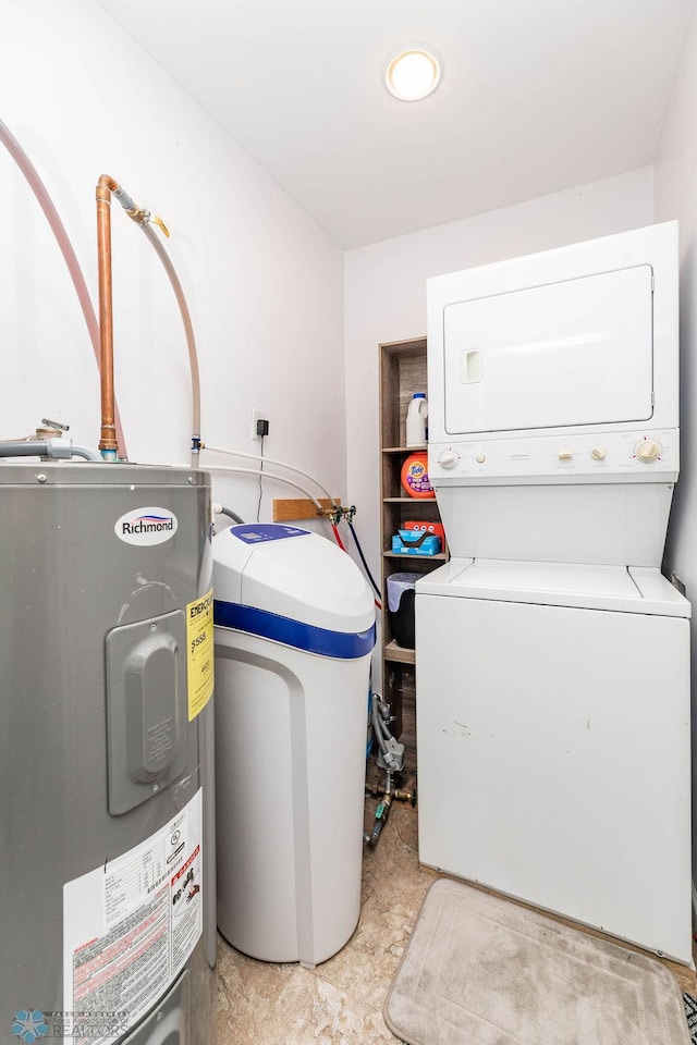 12606 Abbey Lake Ln, Lake View Twp, MN 56501 - washroom featuring stacked washer and clothes dryer and electric water heater