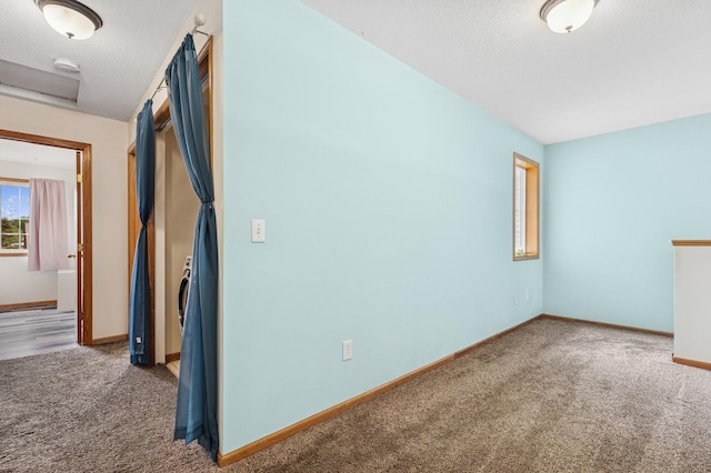 2141 Cleveland Ln S, Cambridge, MN 55008 - carpeted empty room featuring a textured ceiling and a smoke detector