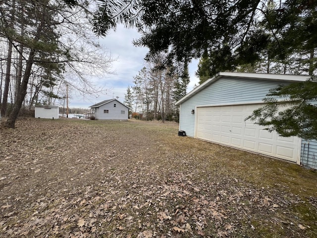 11749 Side Dr, Fine Lakes Twp, MN 55798 - view of yard with an outdoor structure