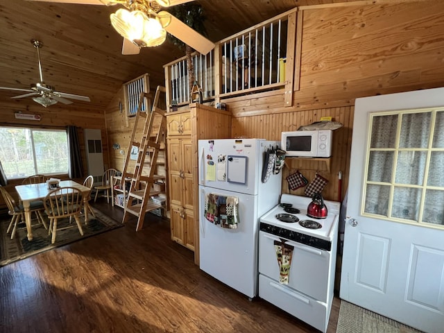 11749 Side Dr, Fine Lakes Twp, MN 55798 - kitchen with white appliances, a ceiling fan, vaulted ceiling, wood walls, and dark wood-style flooring