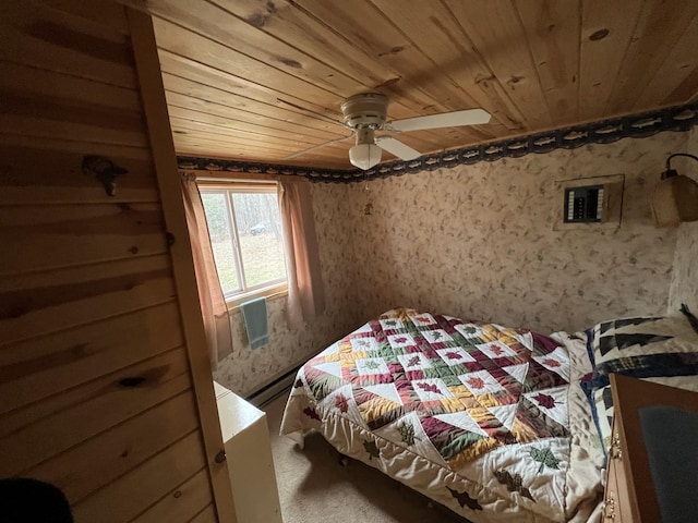 11749 Side Dr, Fine Lakes Twp, MN 55798 - bedroom featuring wood ceiling and wallpapered walls