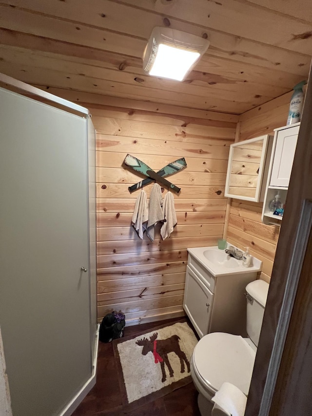 11749 Side Dr, Fine Lakes Twp, MN 55798 - bathroom featuring wooden ceiling, toilet, wood walls, vanity, and a shower stall