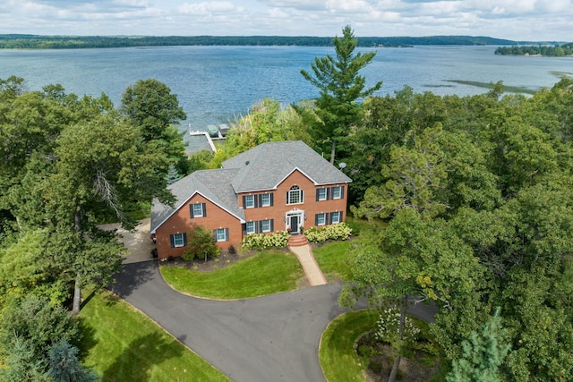 view of subject property with a large body of water