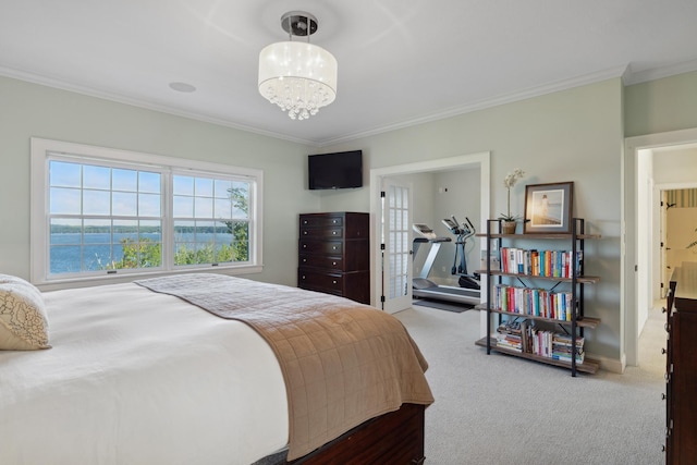 bedroom with carpet, crown molding, a chandelier, and baseboards