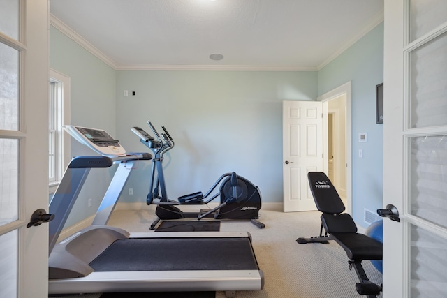 workout room featuring crown molding, carpet flooring, baseboards, and french doors