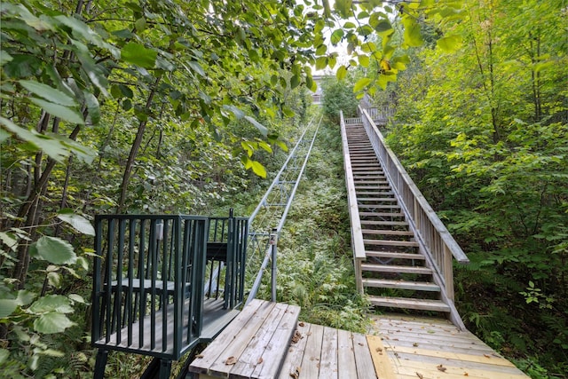 view of property's community featuring stairs