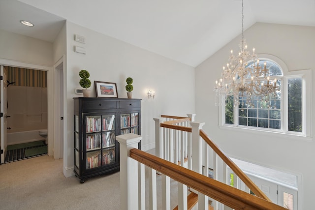 1924 Norway Pine Rd, East Gull Lake, MN 56401 - corridor with an upstairs landing, light colored carpet, plenty of natural light, lofted ceiling, and a chandelier