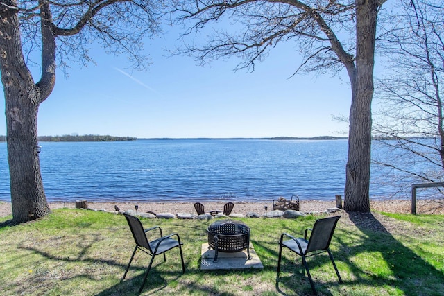 water view with an outdoor fire pit