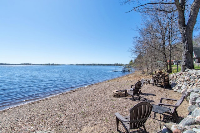 water view with an outdoor fire pit