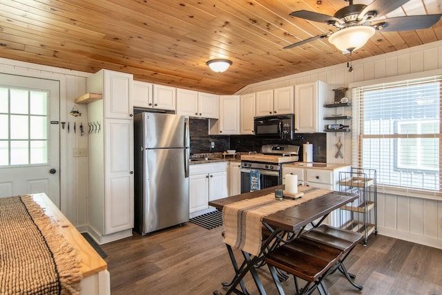 kitchen with stainless steel appliances, tasteful backsplash, dark wood-type flooring, open shelves, and white cabinetry