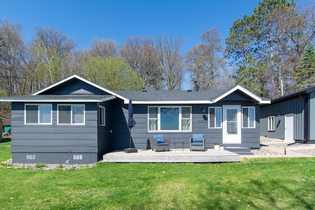 ranch-style house with a wooden deck, a front yard, and crawl space