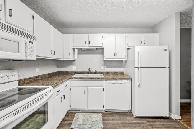 2478 Cobble Hill Alcove Unit C, Woodbury, MN 55125 - kitchen featuring white appliances, a sink, a textured ceiling, dark wood-style flooring, and white cabinets