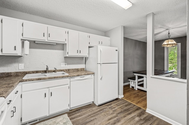 2478 Cobble Hill Alcove Unit C, Woodbury, MN 55125 - kitchen featuring white appliances, a sink, dark wood finished floors, a textured ceiling, and white cabinets