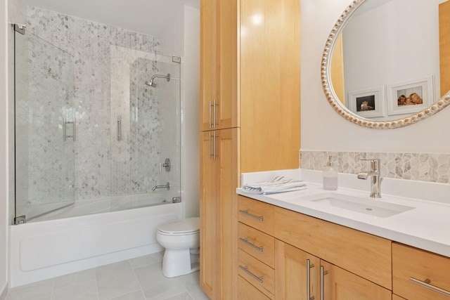 501 Main St N Unit 409, Stillwater, MN 55082 - full bath featuring toilet, shower / bath combination with glass door, vanity, and tile patterned flooring