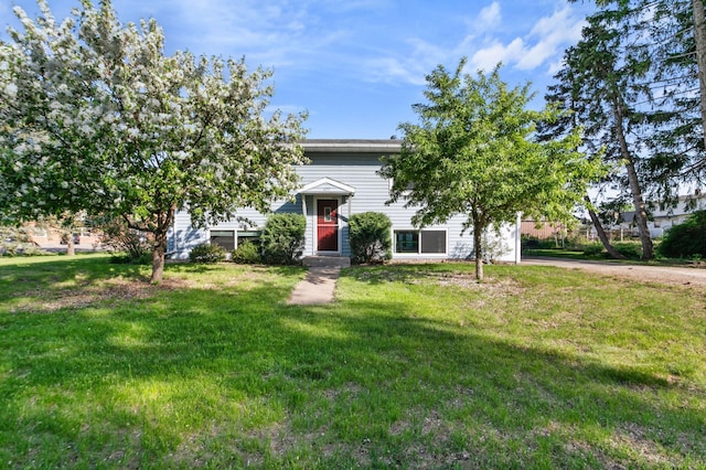 477 Sycamore St, Prescott, WI 54021 - obstructed view of property with a front yard