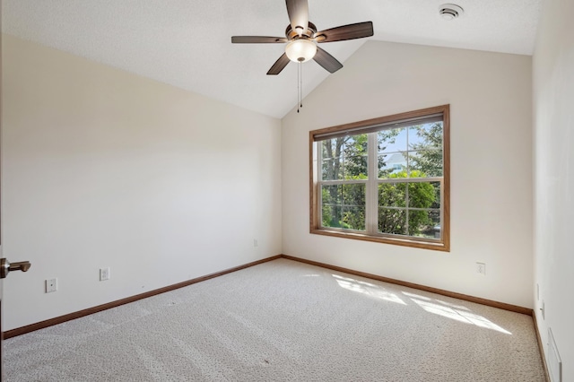 24107 Rivers Edge Rd, Rogers, MN 55374 - carpeted empty room featuring ceiling fan, vaulted ceiling, a smoke detector, and baseboards