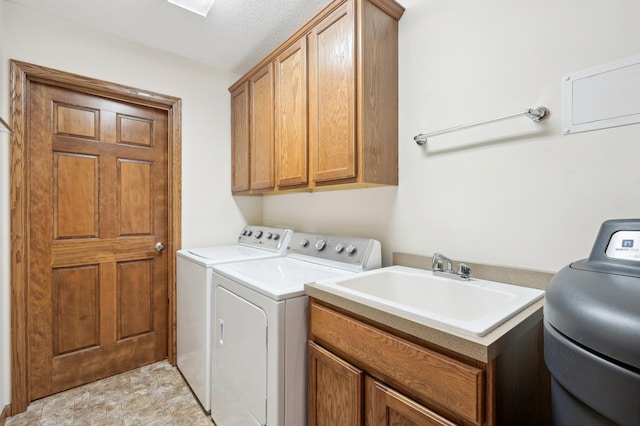 24107 Rivers Edge Rd, Rogers, MN 55374 - laundry area featuring washing machine and clothes dryer and cabinet space