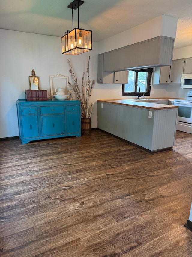 504 Fallwood Rd, Redwood Falls, MN 56283 - kitchen with white appliances, dark wood-style flooring, a peninsula, pendant lighting, and gray cabinets