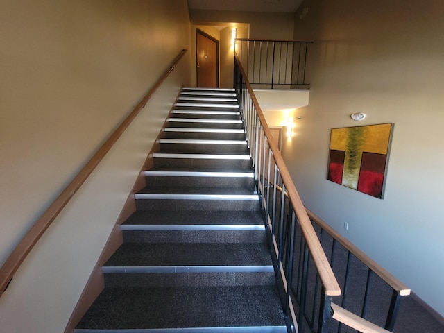 stairway with a high ceiling