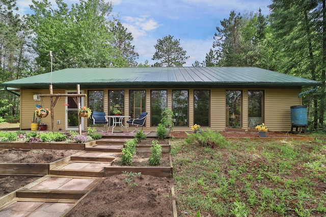 21097 Gilmer Rd, Crosby, MN 56441 - back of property with a garden and metal roof