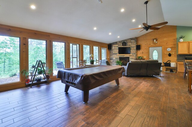 21097 Gilmer Rd, Crosby, MN 56441 - rec room with healthy amount of natural light, a ceiling fan, wood walls, billiards table, and dark wood-style floors