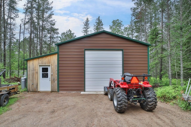 21097 Gilmer Rd, Crosby, MN 56441 - view of outdoor structure with an outbuilding and driveway