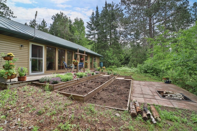 21097 Gilmer Rd, Crosby, MN 56441 - view of yard featuring a vegetable garden and a patio