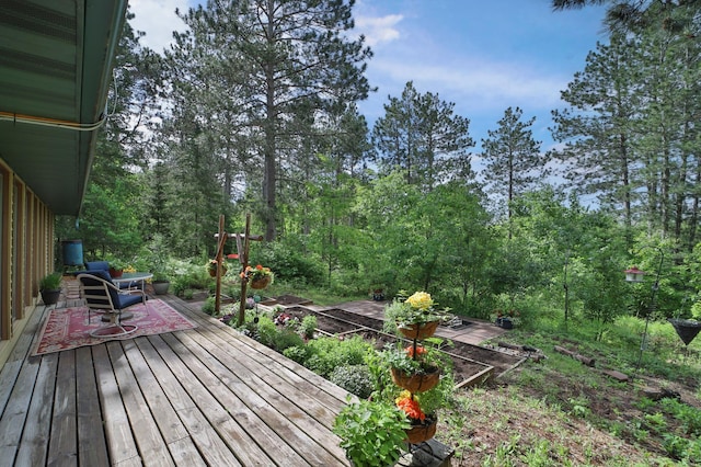 21097 Gilmer Rd, Crosby, MN 56441 - wooden terrace with a vegetable garden