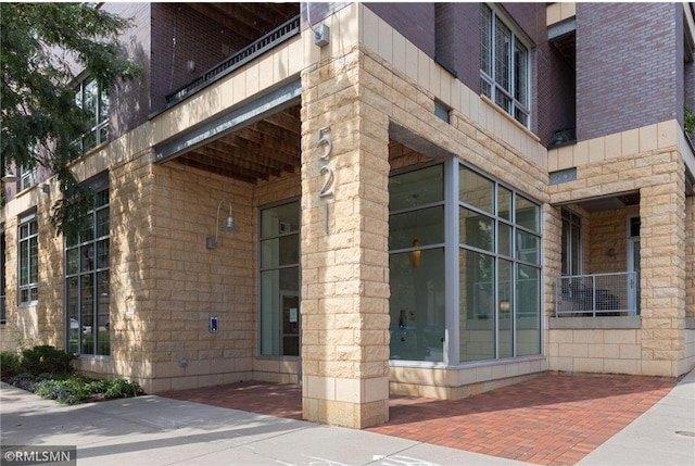 521 2nd St SE Unit 206, Minneapolis, MN 55414 - property entrance featuring stone siding