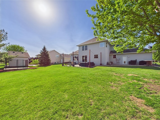 view of grassy yard featuring an outdoor living space and a patio area