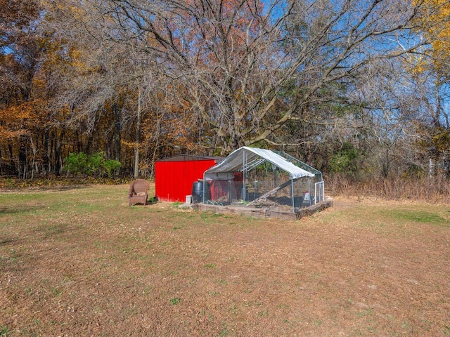 41218 Nelson Rd, North Branch, MN 55056 - view of grassy yard featuring an outdoor structure and exterior structure