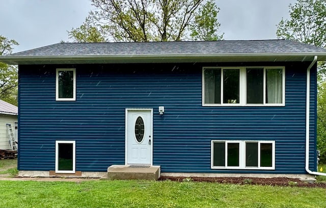 1123 Tyler Ave SE, Bemidji Twp, MN 56601 - view of front of home featuring a front yard