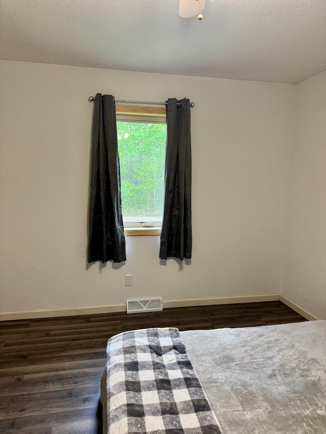 1123 Tyler Ave SE, Bemidji Twp, MN 56601 - bedroom with wood finished floors and baseboards