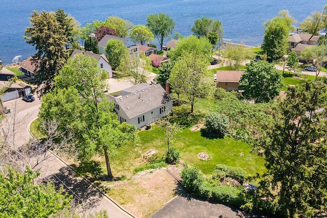 aerial view of residential area with a nearby body of water