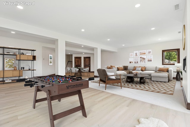 2169 Ibson Ave SE, Rockford Twp, MN 55313 - recreation room featuring light wood finished floors and recessed lighting