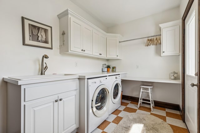 2169 Ibson Ave SE, Rockford Twp, MN 55313 - washroom with cabinet space, washing machine and dryer, light floors, and baseboards