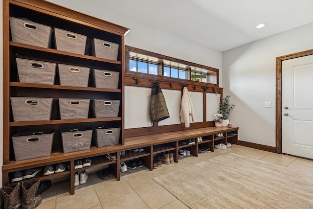2169 Ibson Ave SE, Rockford Twp, MN 55313 - mudroom with tile patterned floors and baseboards