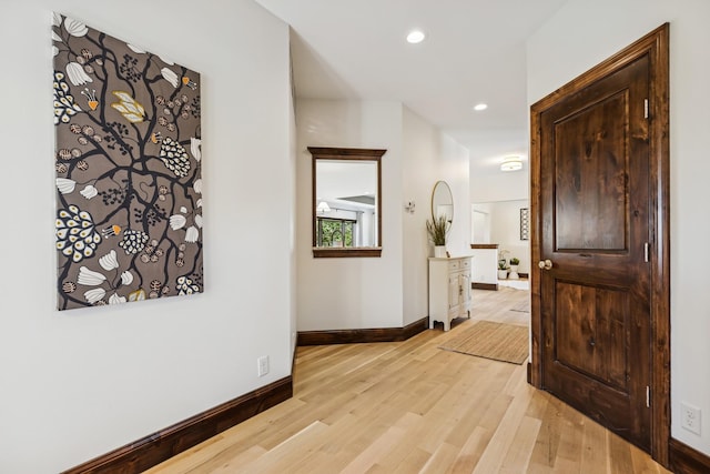 2169 Ibson Ave SE, Rockford Twp, MN 55313 - hallway with baseboards, light wood-style floors, and recessed lighting