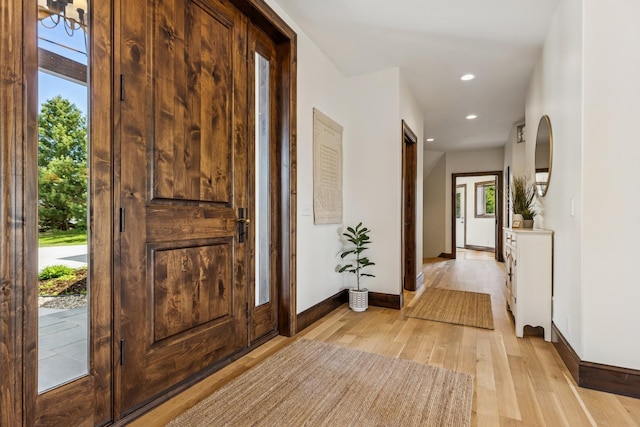 2169 Ibson Ave SE, Rockford Twp, MN 55313 - foyer with baseboards, light wood finished floors, and recessed lighting