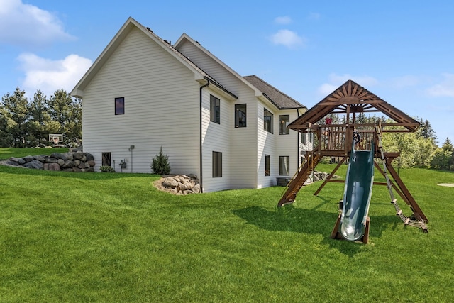 2169 Ibson Ave SE, Rockford Twp, MN 55313 - view of home's exterior featuring a playground and a yard