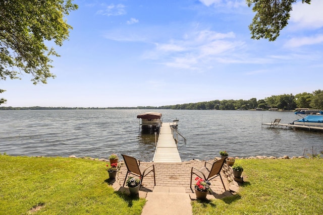 21140 654th Ave, Litchfield, MN 55355 - dock area featuring a water view, a lawn, and boat lift