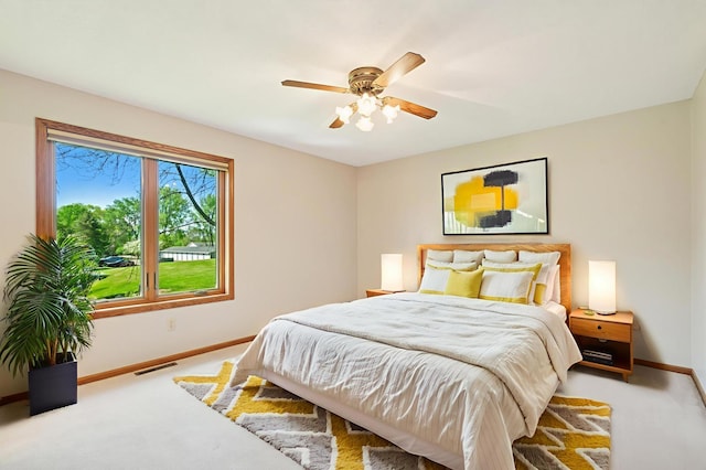 2558 75th St E, Inver Grove Heights, MN 55076 - carpeted bedroom with baseboards and ceiling fan