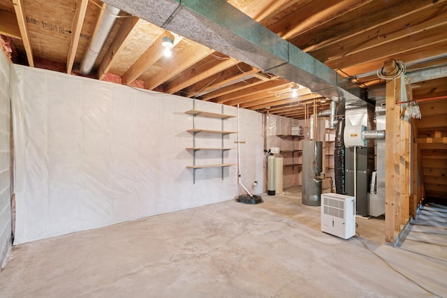 2558 75th St E, Inver Grove Heights, MN 55076 - unfinished below grade area featuring water heater, a water softener system, and heating unit