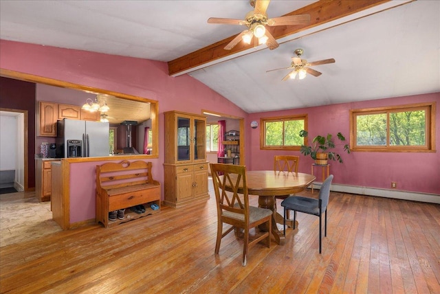 1361 60th St Unit D, Apple River Twp, WI 54889 - dining room with light wood finished floors, baseboard heating, and a ceiling fan