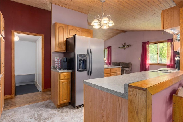 1361 60th St Unit D, Apple River Twp, WI 54889 - kitchen with stainless steel fridge, a chandelier, vaulted ceiling, wood ceiling, and hanging light fixtures