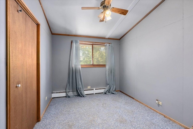 1361 60th St Unit D, Apple River Twp, WI 54889 - carpeted spare room featuring lofted ceiling, crown molding, a ceiling fan, a baseboard heating unit, and baseboards