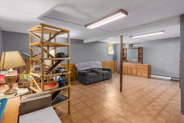 1361 60th St Unit D, Apple River Twp, WI 54889 - below grade area featuring a baseboard heating unit and wood walls