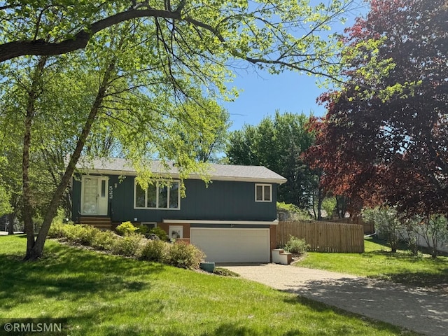522 Fairview Dr, Luverne, MN 56156 - view of front of house with driveway and a garage
