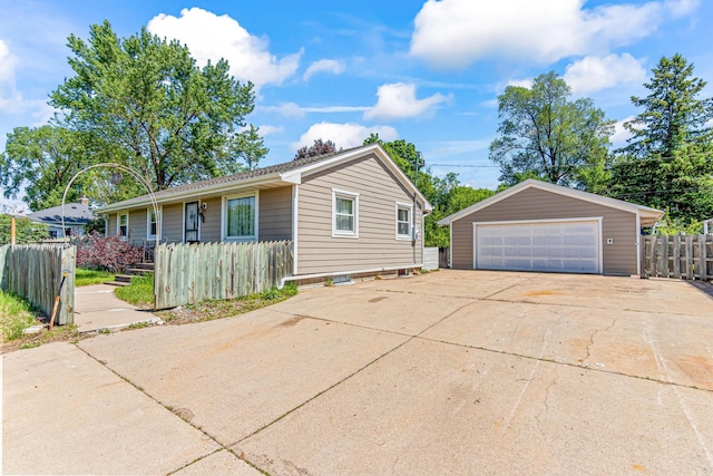 7109 Penn Ave S, Richfield, MN 55423 - view of front of property with a detached garage and an outdoor structure